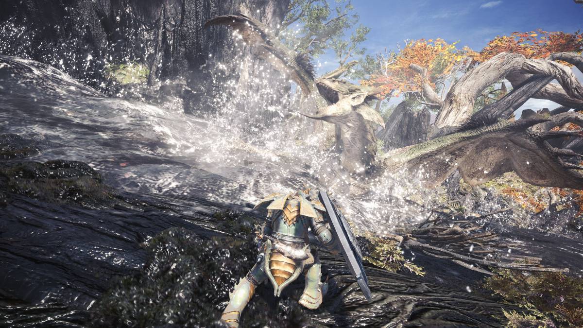 A playable character facing off against a beast in Monster Hunter World.