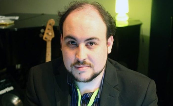 A headshot of Youtuber Totalbiscuit