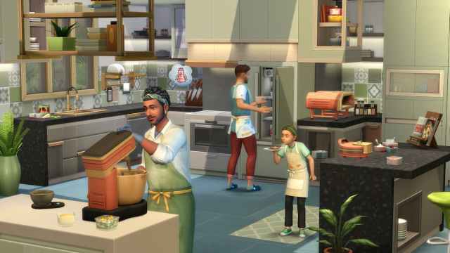 Sim family cooking in Sims 4.