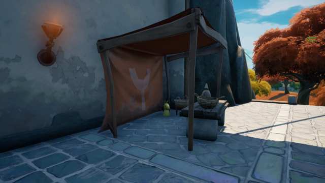 where to find golden artifacts near the spire in Fortnite