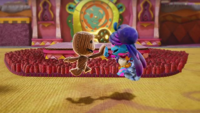 Sackboy high-fiving a character