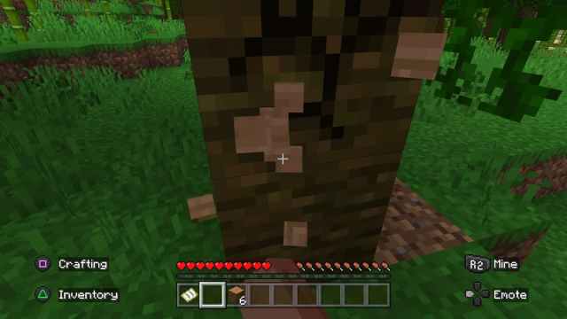 Collecting wood in Minecraft