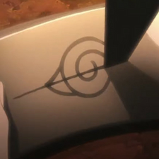 Itachi scratching out the leaf village symbol