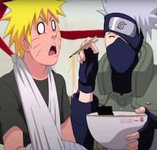 Kakashi feeding Naruto and being cute about it