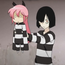 Senyuu holding up little girl in matching striped outfits