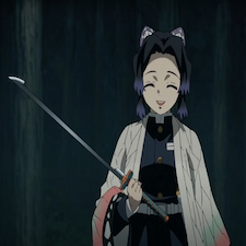 Shinobu smiling while holding her sword