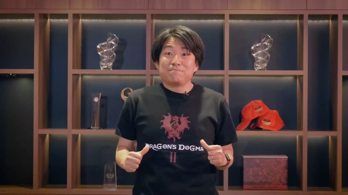 Hideaki Itsuno wearing dragon's dogma 2 t-shirt