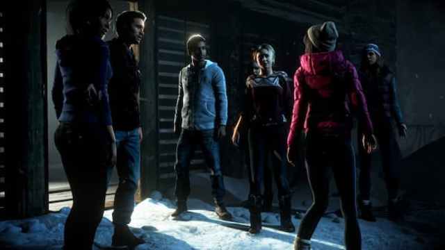 The lead characters standing outside the cabin in Until Dawn