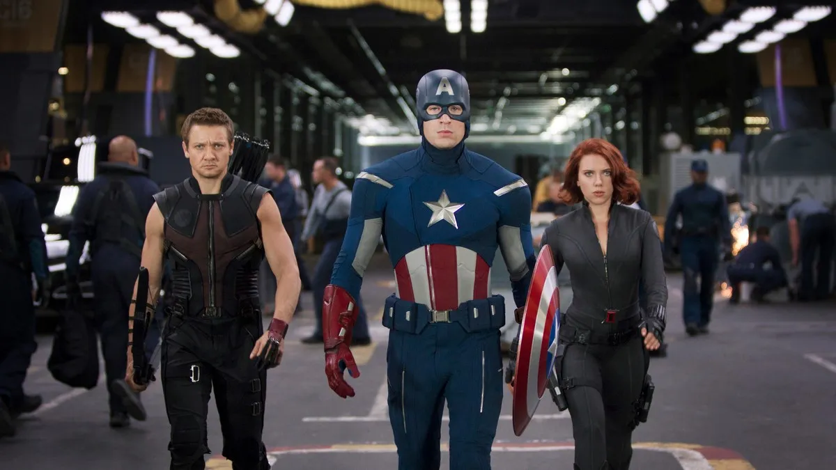 Captain America, Hawkeye and Black Widow walking towards camera