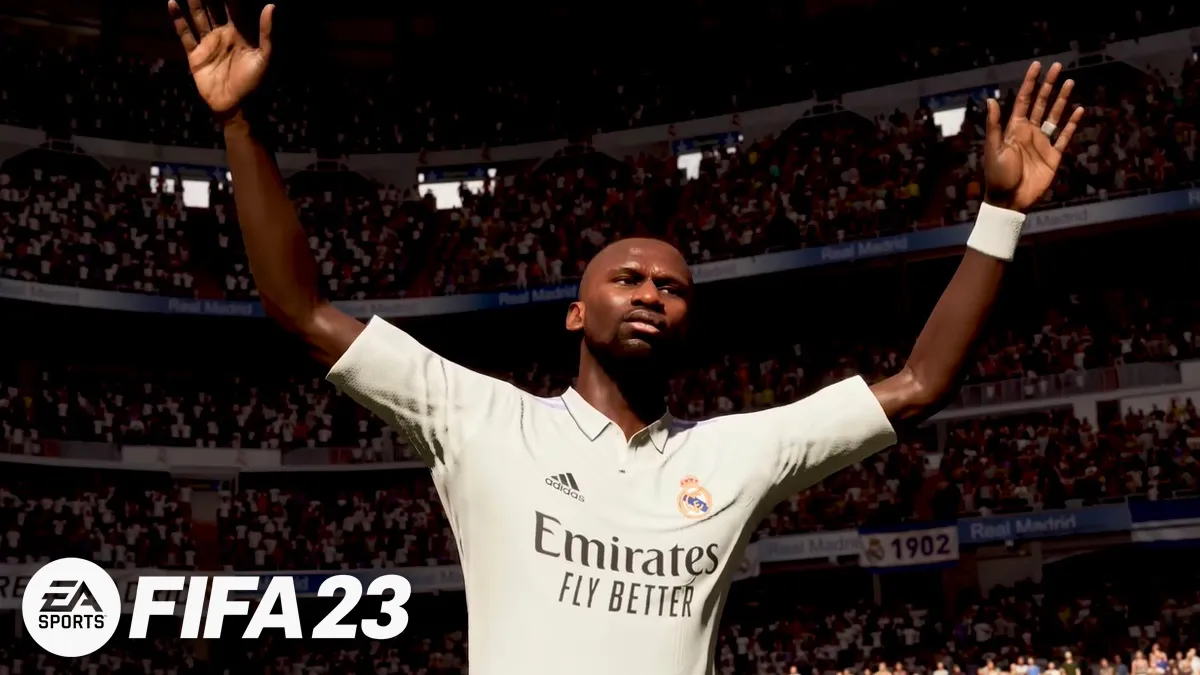 Antonio Rudiger in FIFA 23 with arms aloft and FIFA 23 logo