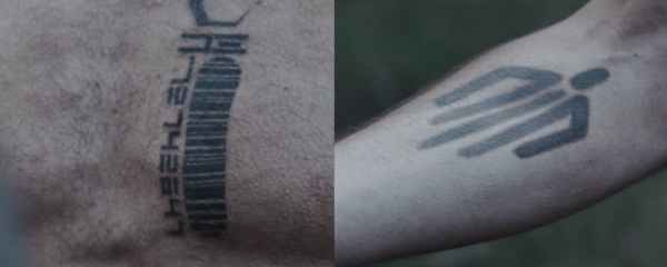 Arvel Skeens tattoos: a barcode and a hand shape