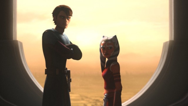 Anakin and Ahsoka standing next to each other. 