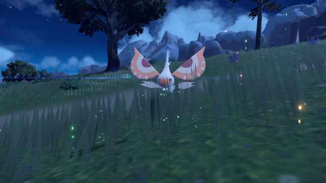 Masquerain in the tall grass in Pokemon Scarlet and Violet. 