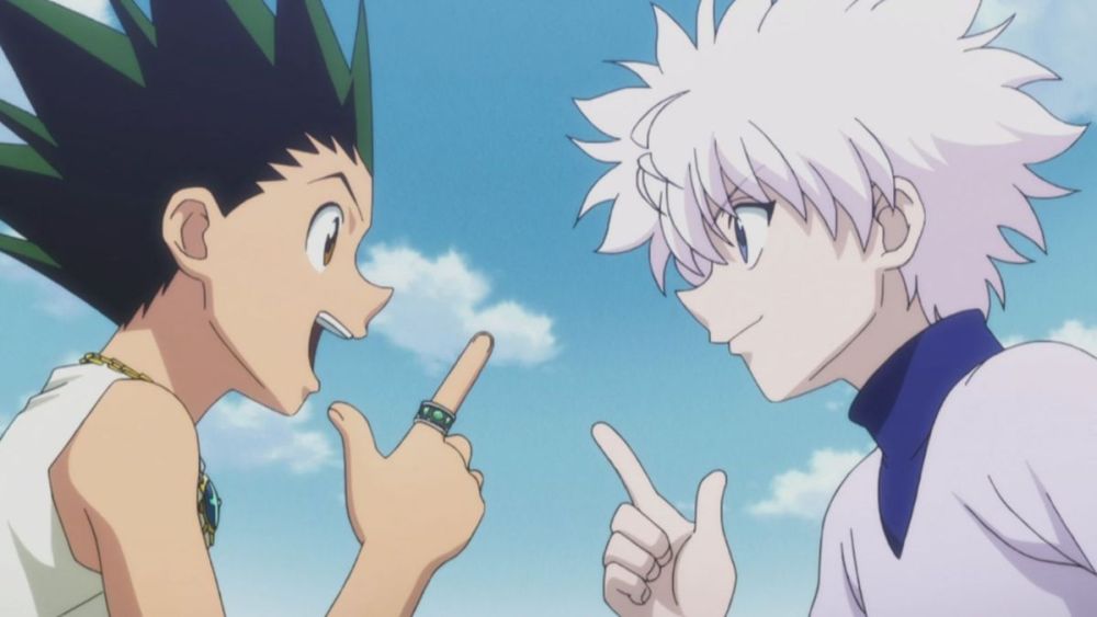 Gon and Killua Pointing Into the Air Together in Hunter X Hunter