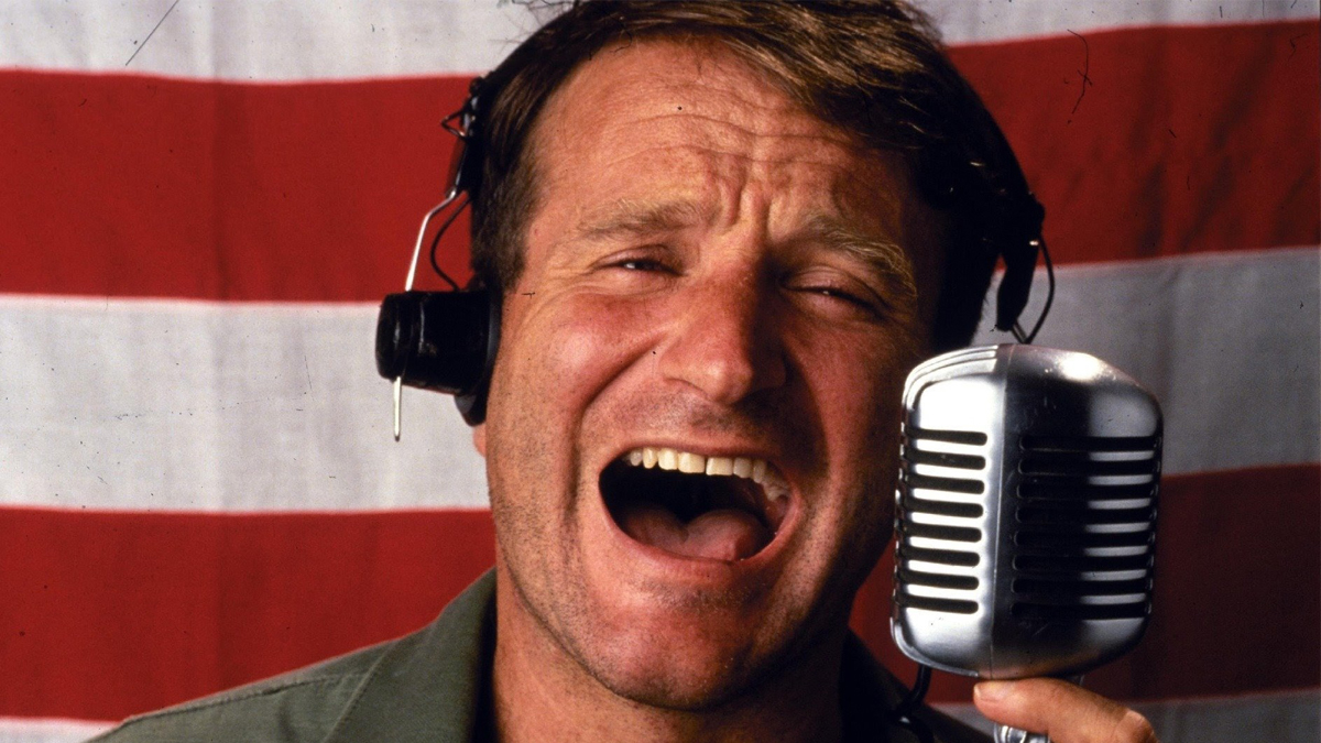 Robin Williams as Adrian Cronauer in Good Morning Vietnam.