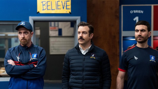 Brendan Hunt as Coach Beard, Jason Sudeikis as Ted Lasso and Brett Goldstein as Roy Kent in Ted Lasso.