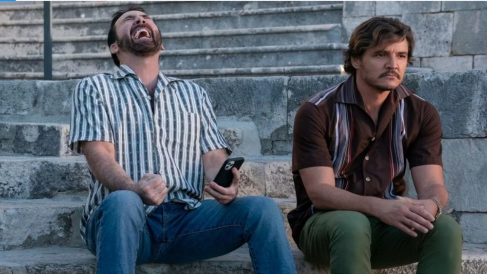 Nicolas Cage as "Nicolas Cage" and Pedro Pascal as Javi Gutierrez in The Unbearable Weight of Massive Talent.