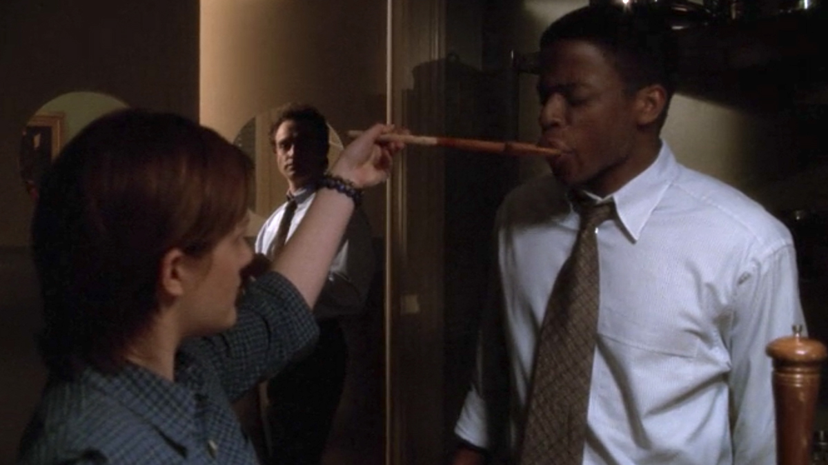 Elisabet Moss as Zoey, and Dulé Hill as Charlie on The West Wing.