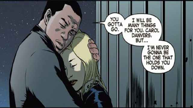 Carol Danvers and Rhodey in a hug