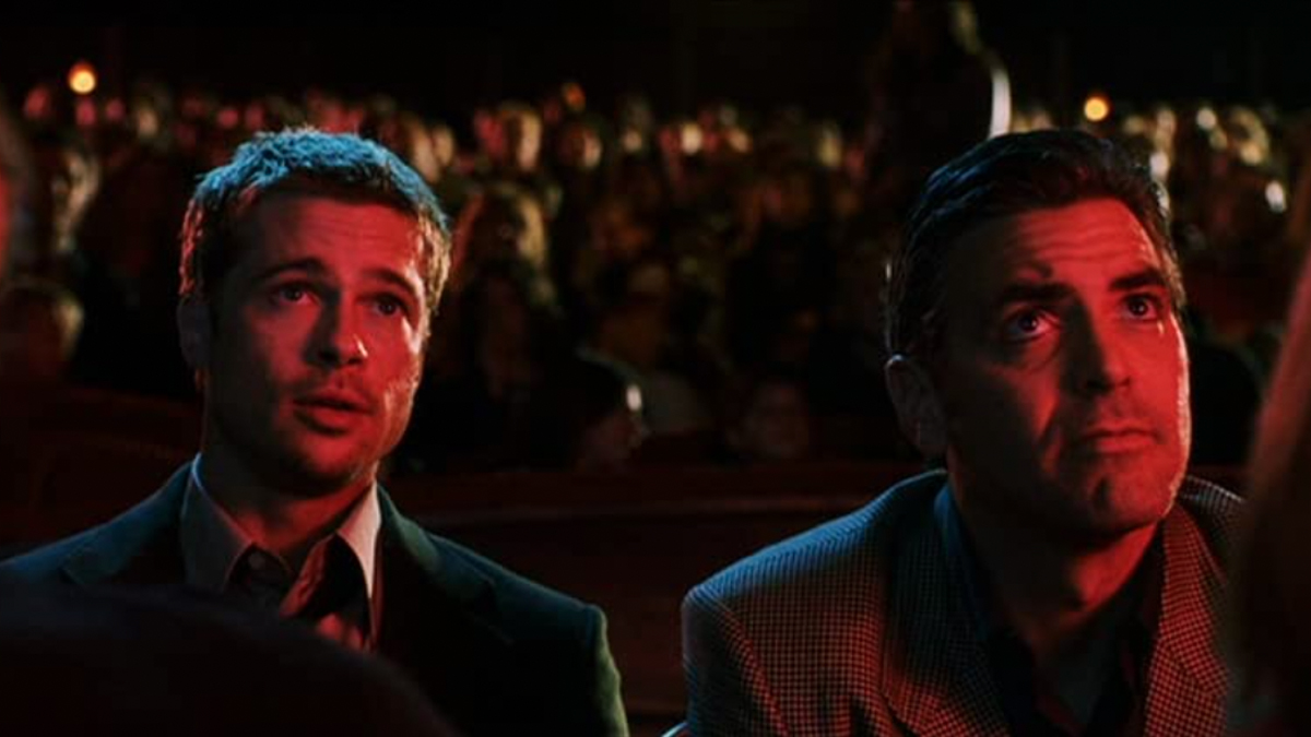 Brad Pitt as Rusty and George Clooney as Danny in Ocean's Eleven.