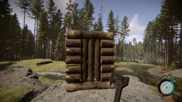 the player character building a wooden door in Sons of the Forest