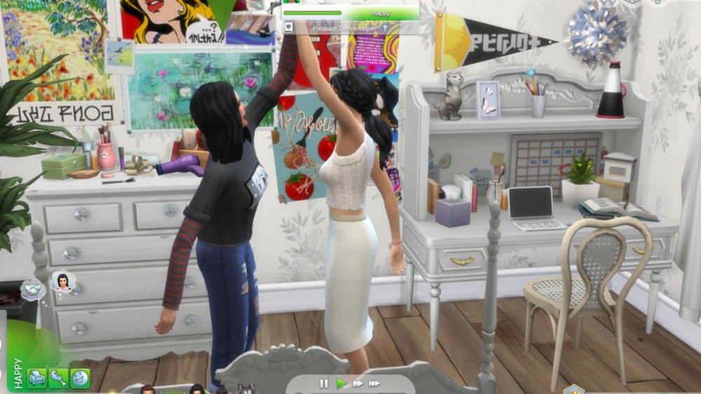 Two Sims high-fiving. 