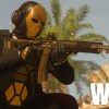 MW2 character in gold skin with AR next to Warzone 2 logo