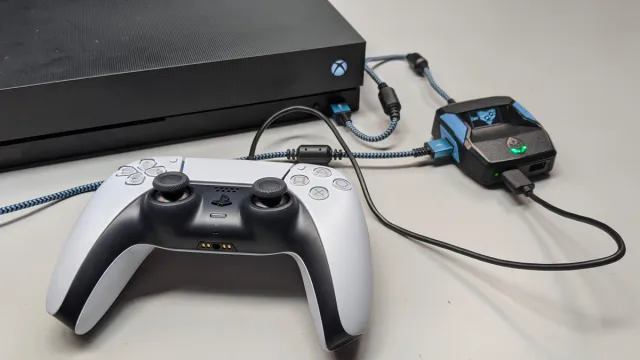 Cronus Zen being used on a PS5 controller