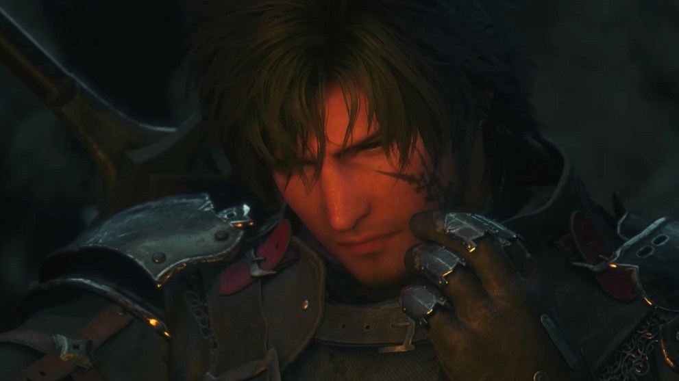 Clive touches the brand on his cheek in FF16.