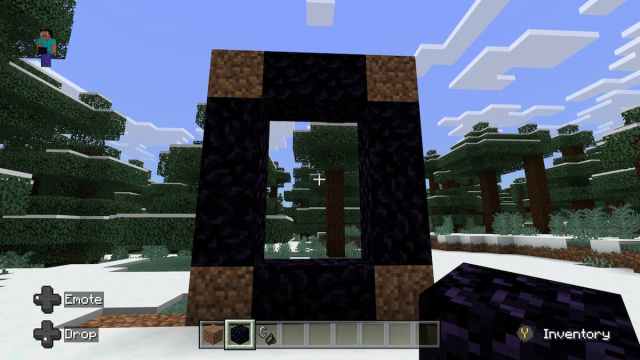 building a Nether Portal with dirt blocks on the corners and 10 obsidian in Minecraft