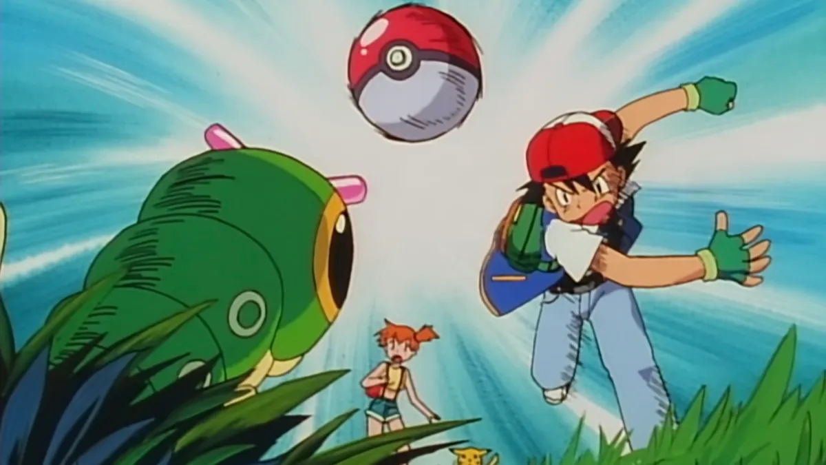 Ash throws a Poke Ball at Caterpie in the Pokemon anime. Misty and Pikachu help by doing nothing.