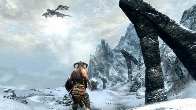 Character facing mountains and dragon in promo shot for Skyrim