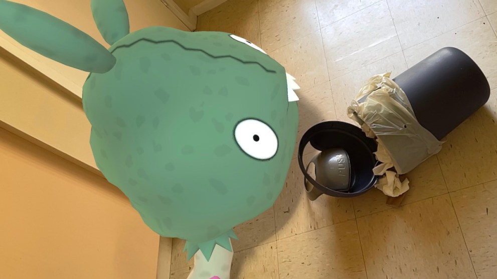 A screenshot of Trubbish with a trash bin from Pokemon GO