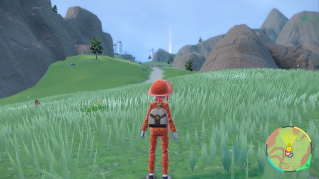 The player character walks around Paldea in Pokemon Scarlet/Violet