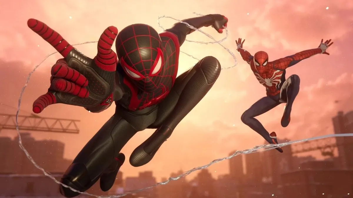 Miles and Peter, in their Spider-Man suits, swing through New York.