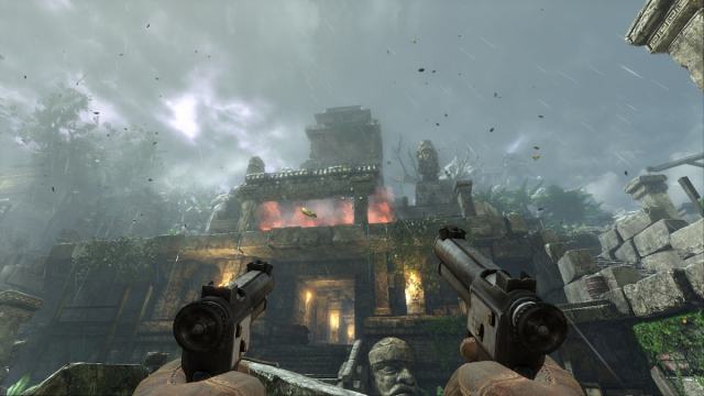 A screenshot of the main character holding two pistols while looking at Mayan Ruins