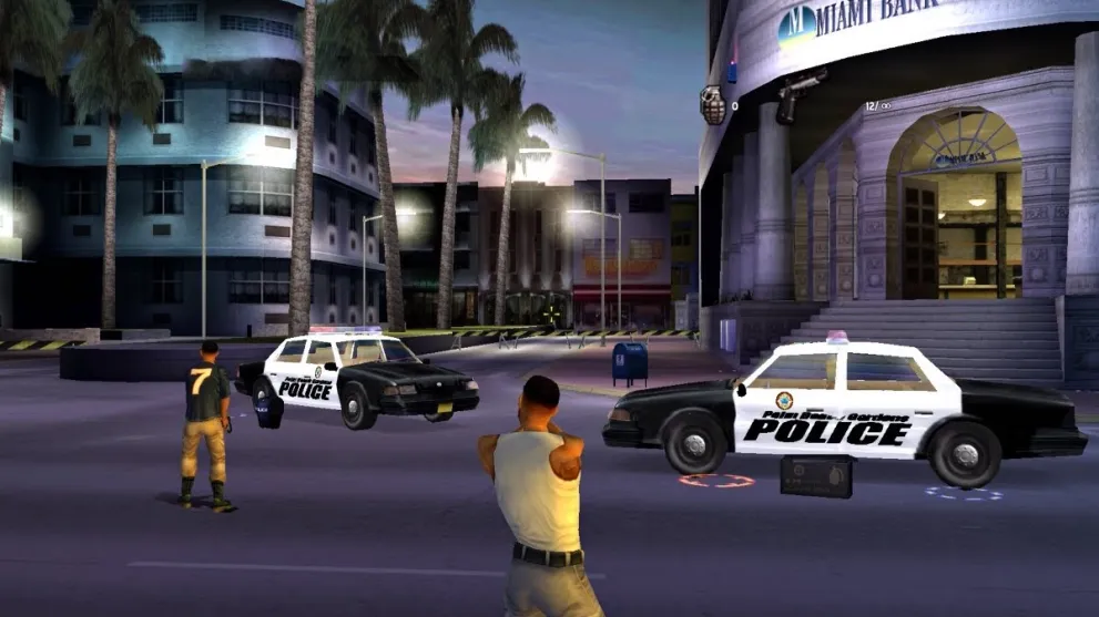 Marcus Burnett and Mike Lowrey shooting in front of a bank in Bad Boys: Miami Takedown for PS2.