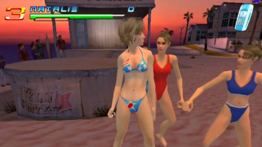 One of the Charlie's Angels characters in a bikini, fighting on a beach in Charlie's Angels for the PS2.
