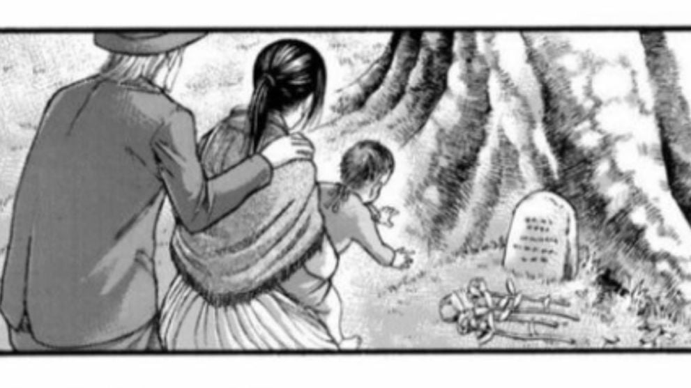 Mikasa visiting Eren's grave with her child and husband