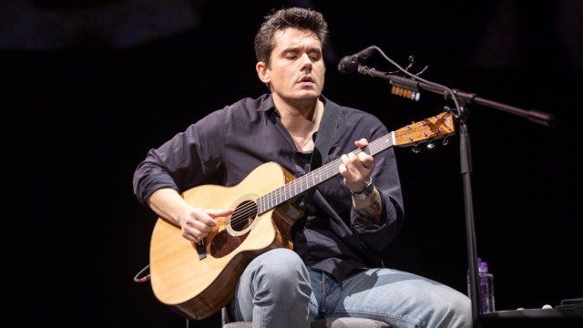 John Mayer performs a song with a peculiar look of intensity on his face