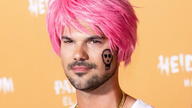 Taylor Lautner has the time of his life at Heidi Klum's Halloween party