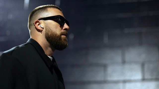 Travis Kelce of the Kansas City Chiefs intimidates his foes by pretending he is Albert Wesker prior to an NFL game. COMPLETE GLOBAL SATURATION, he hisses, which is incidentally how I feel about Taylor Swift coverage at every Chiefs broadcast