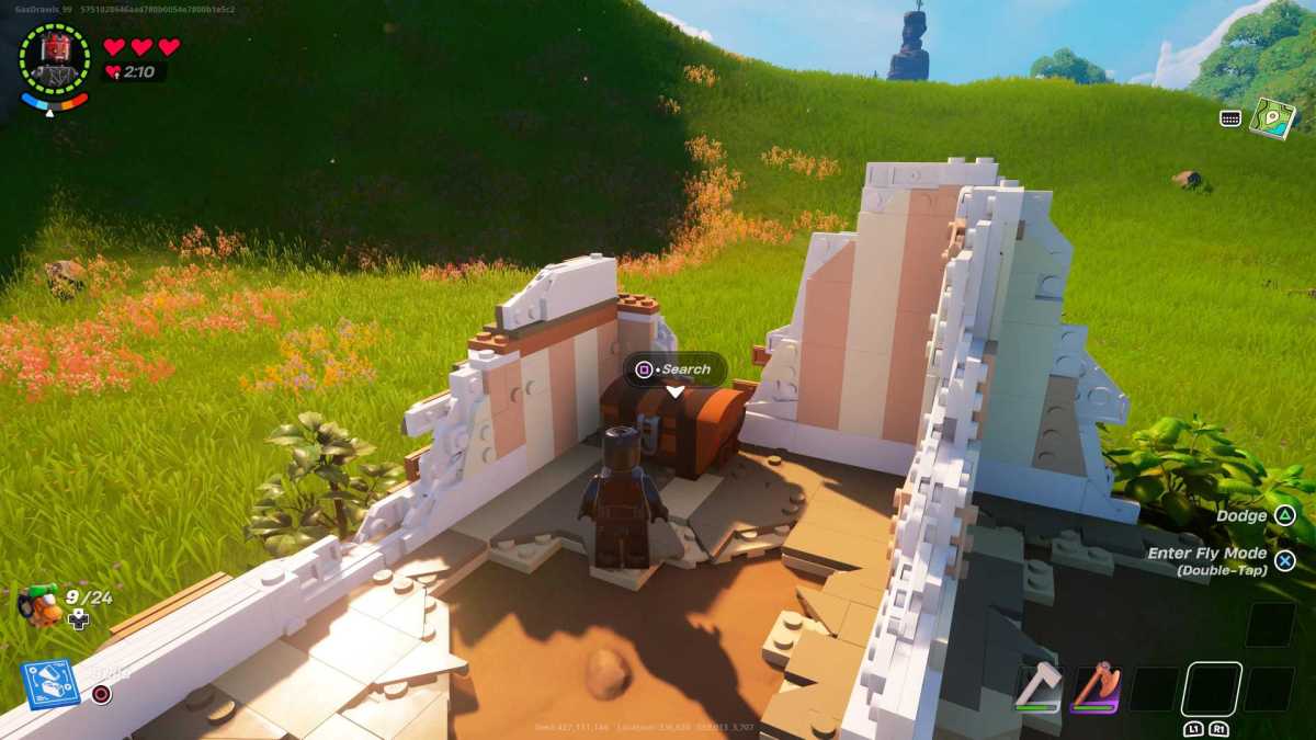 The player searching a chest in LEGO Fortnite.