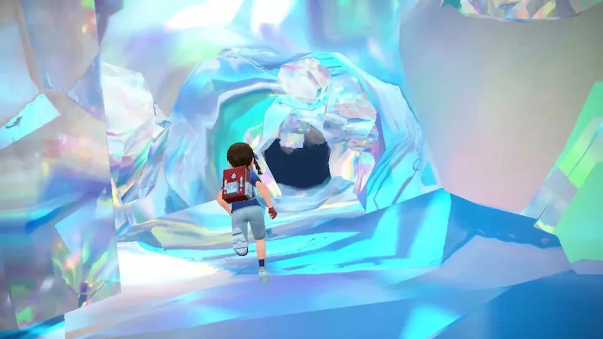A trainer running through a crystal cave in Pokemon Scarlet & Violet Indigo Disk.