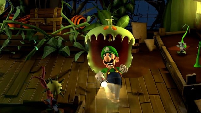 Luigi fleeing from a plant monster in Luigi's Mansion 2 HD.