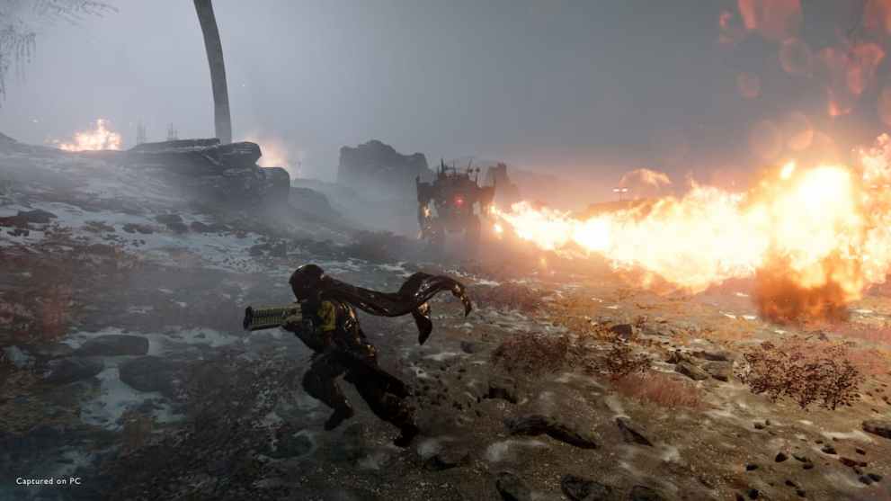 A robot firing a flamethrower in Helldivers 2.