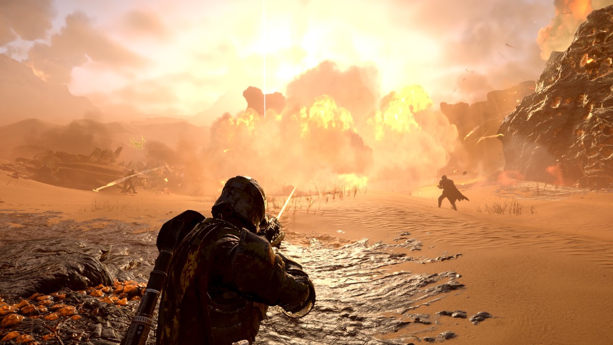 The player character shooting across a desert planet in Helldivers 2.