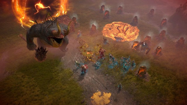 Players fighting a huge beast in Diablo IV.