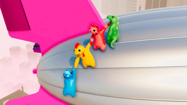 Characters about to fall off of a blimp in Gang Beasts.