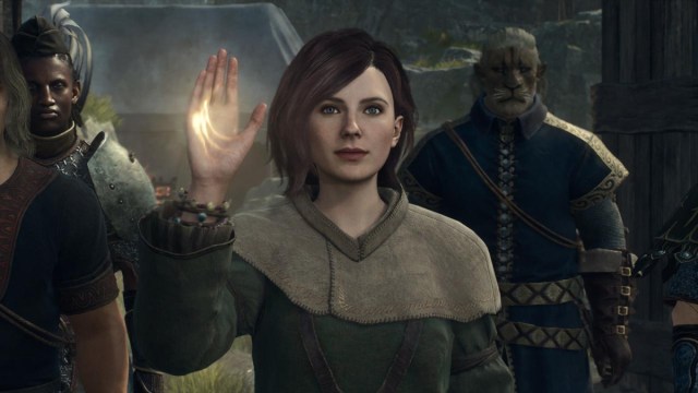 Pawn Raising Glowing Hand While Other Pawns Are Behind Them in Dragon's Dogma 2